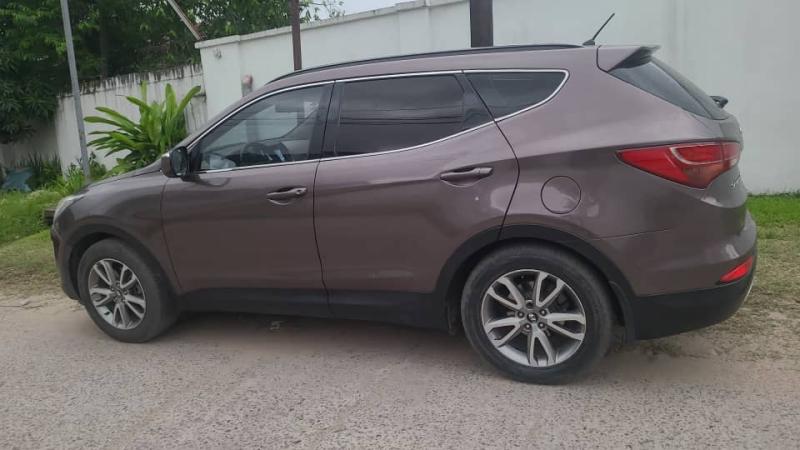 Hyundai SANTAFE Annee  2014 Automatique Steptronique Essence 4 cylindre Interior Cuire 77.000 km 4 x 4 Phares Led Telephonebleutooth Cruise Control Us