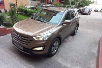 Hyundai Santa Fe  Annee  201415 Automatique Steptronique Essence 6 cylindre Interior tissus 4 x 4 47000 km 3 banquette 7 places TelephoneBleutooth Phares Led Cruise