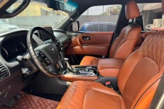 NISSAN PATROL PLATINUM V8 Anne 2015 Modifier 2023  Full option   Volant gauche  Intrieur en cuir   toit ouvrant    4 Camra  360  Automatique   Essence   plafond