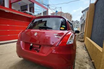 SUZUKI SWIFT NOUVEAU   Sans plaque  Version 2013 Couleur rouge dorigine  Full options avec des palettes au volant Moteur bote impeccable  Vhicule trs neuf   6.000