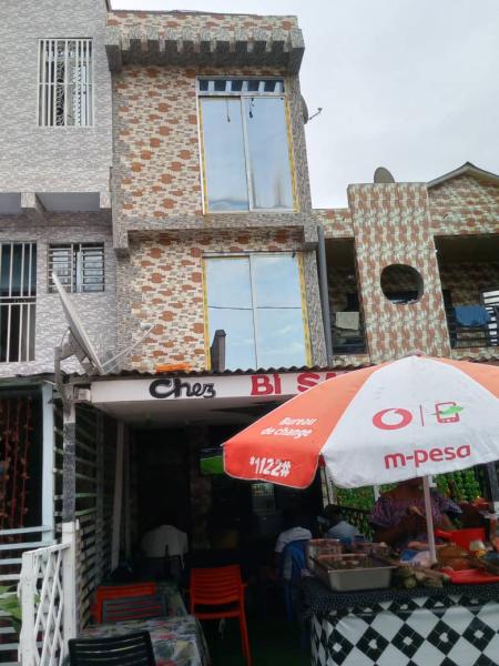 VENTE PARCELLE EN TAGE AVEC DEUX APPARTEMENTS PLUS MAISON COMMERCIAL  BANDAL 