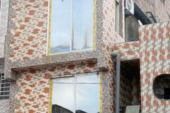 VENTE PARCELLE EN TAGE AVEC DEUX APPARTEMENTS PLUS MAISON COMMERCIAL  BANDAL 