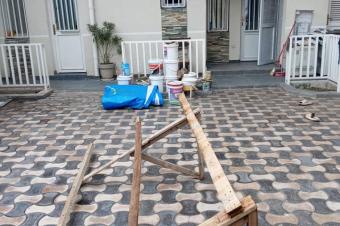 Immeuble  vendre  20mai sur macadam dans la commune de kalamu 