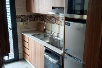 Immeuble  vendre  20mai sur macadam dans la commune de kalamu 