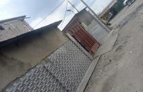 Parcelle à vendre avec des maisons type Locataires dans la commune de NDJILI Q6 sur macadam  mediacongo