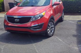 KIA SPORTAGE SANS PLAQUE 2015  PRIX 13.500 LISOLO MUKIE KK.   AUTOMATIQUE ESSENCES KILOMTRAGE TRS FAIBLES CLIMATISATION IMPECCABLES FULLS OPTIONS LOCALISATION KALAMU
