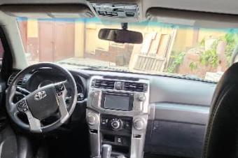 TOYOTA 4 RUNNERS SANS PLAQUE 2018  PRIX 33.000 LISOLO MUKIE KK.   AUTOMATIQUE ESSENCES KILOMTRAGE TRS FAIBLES CLIMATISATION IMPECCABLES FULLS OPTIONS LOCALISATION LIMETE
