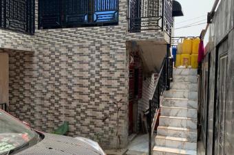 Vente parcelle clture avec immeuble locatif  Ngaliema excellent emplacement