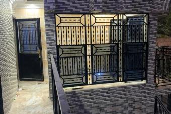 Vente parcelle clture avec immeuble locatif  Ngaliema excellent emplacement