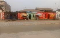 Vente parcelle avec 6 portes de locataires – N’djili Quartier 7 (sur macadam) mediacongo