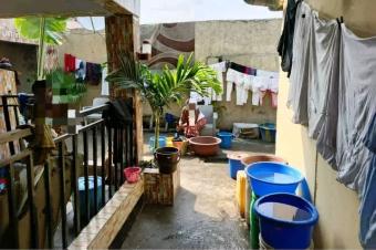 Parcelle locative en vente  NgiriNgiri  3 maisons incluses