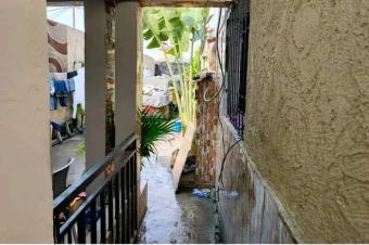 Parcelle locative en vente  NgiriNgiri  3 maisons incluses