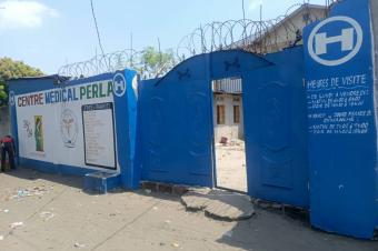 Parcelle avec immeuble et maison  vendre  Efobank NSele