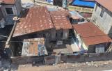 Parcelle à vendre à mbudi contenant une maison à détruire 13msur15 90000 dollars à discuter 