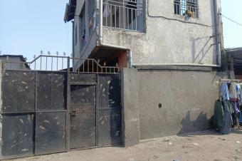 Parcelle  vendre  Ndjili Quartier 9 avec deux maisons  65.000  discuter