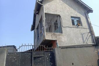Parcelle  vendre  Ndjili Quartier 9 avec deux maisons  65.000  discuter
