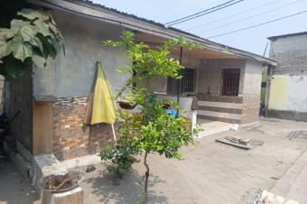 Parcelle commerciale  vendre sur  Boulevard Lumumba  Quartier Terre Jaune