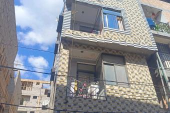 Immeuble locatif 8 appartements  Barumbu proche asphalte