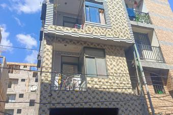 Immeuble locatif 8 appartements  Barumbu proche asphalte