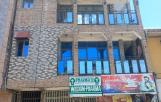 Immeuble rentable à vendre – Barumbu, macadam