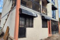 Parcelle à vendre à Ngaliema binza ozone référence église la borne avec un bâtiment de R+1 immobilier_vente_location