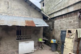Vente dune Parcelle  Mbudi avec une Grande maison  Annexe