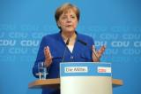 Migrants: Merkel reste fragilisée après avoir sauvé son gouvernement 