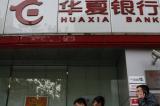 Un Chinois amasse un million de dollars en exploitant un bug des distributeurs de billets