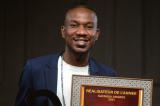 Katanga Award 2021 : Jackem Mbay 26 ans, reçoit le prix du meilleur réalisateur des vidéos.